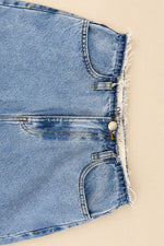 Calça Jeans Naila — detalhe do cós desfiado
